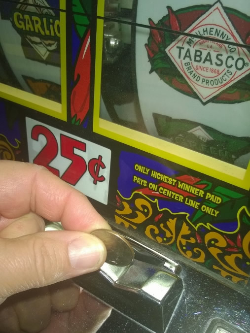 Slot Machines with Coin Handling